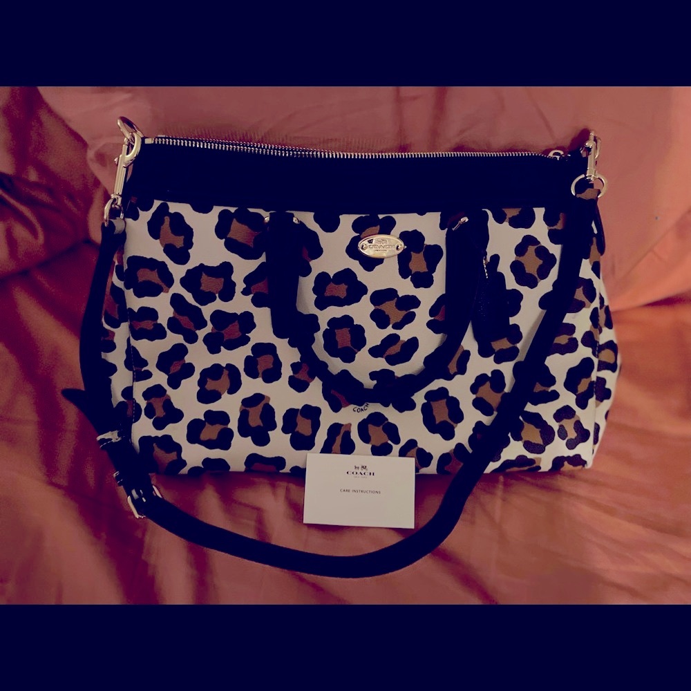 Rare ocelot coach purse
